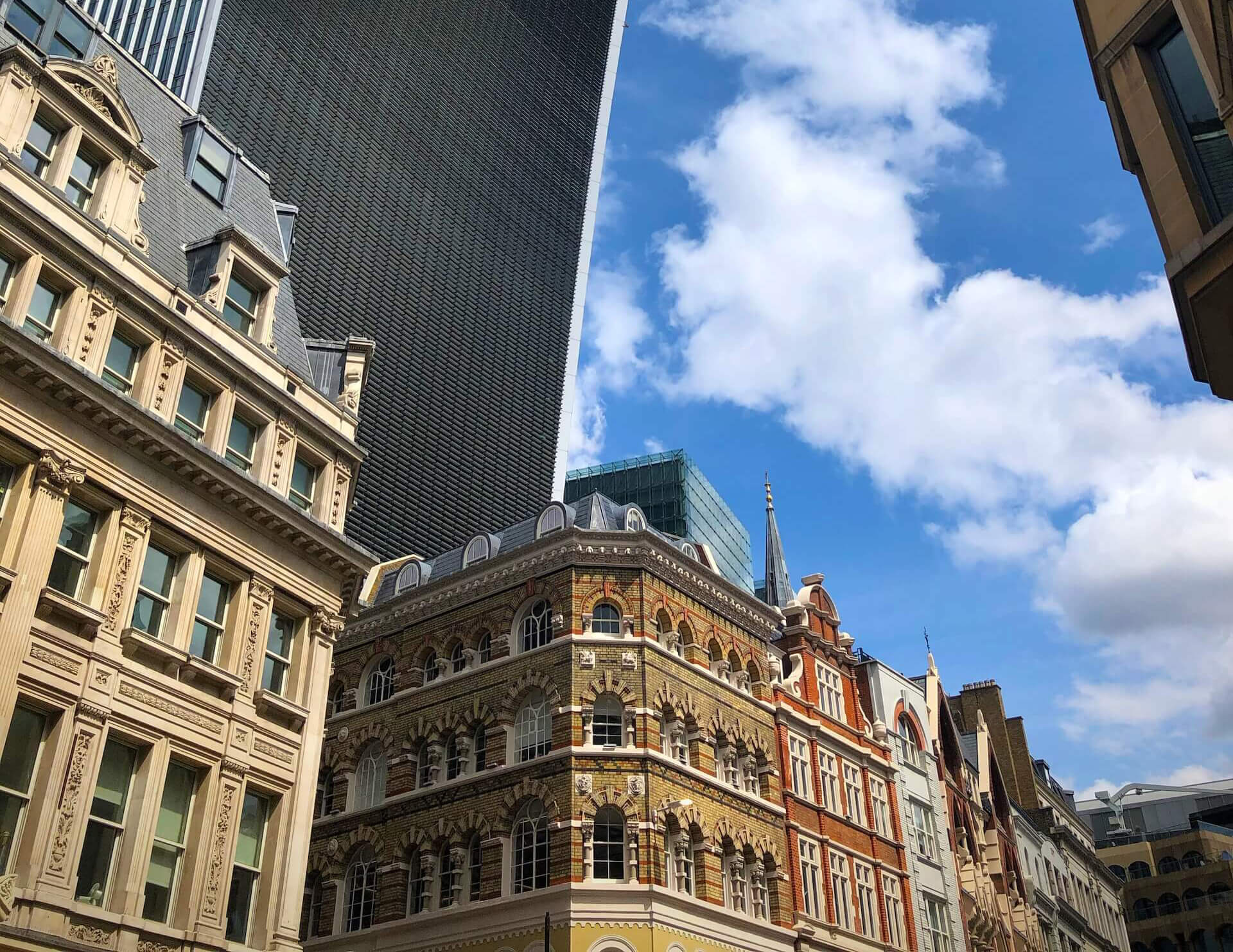 Image of buildings in London with tall skyscraper and sky in the background